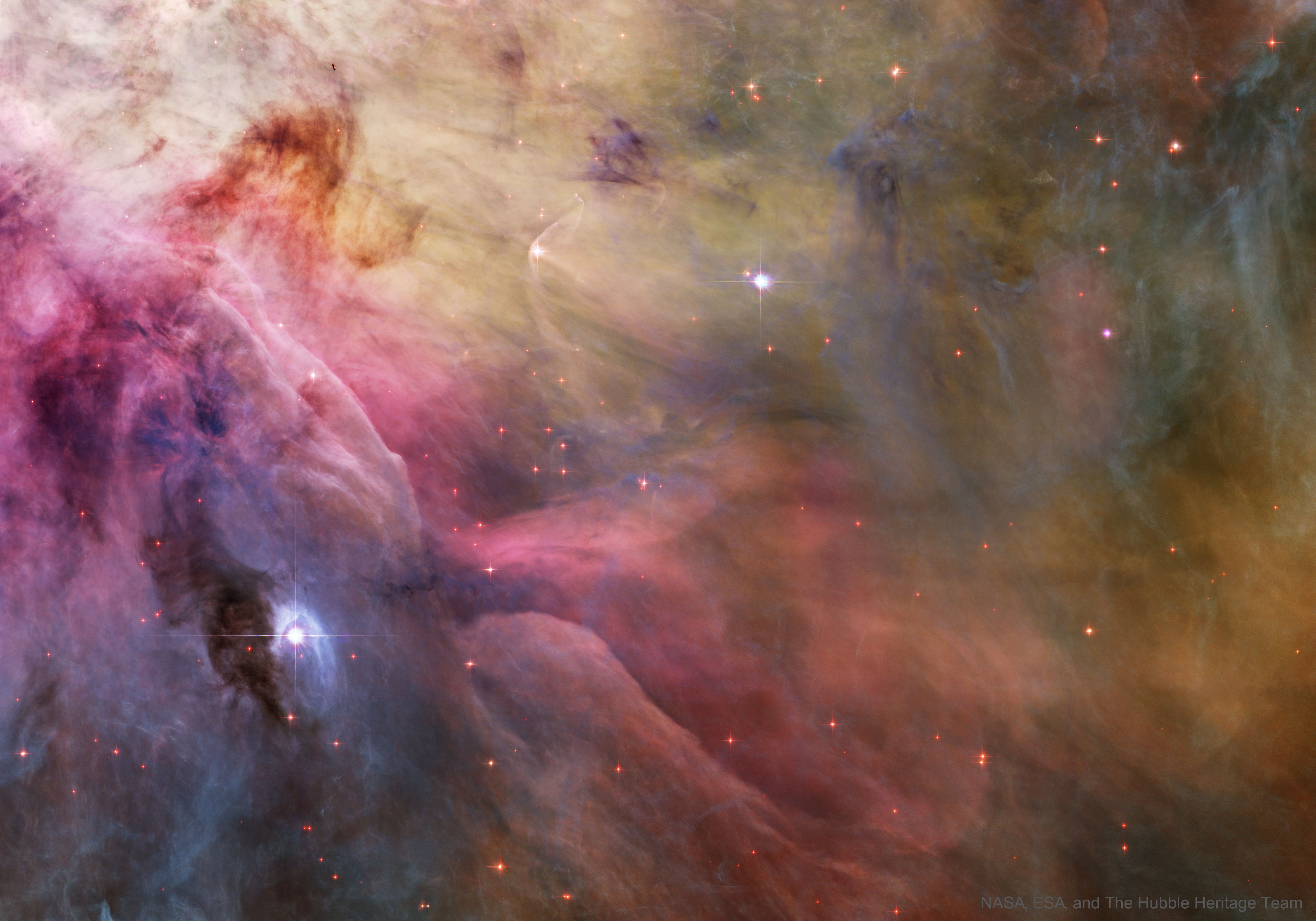 LL Ori and the Orion Nebula by  NASA, ESA, and The Hubble Heritage Team
