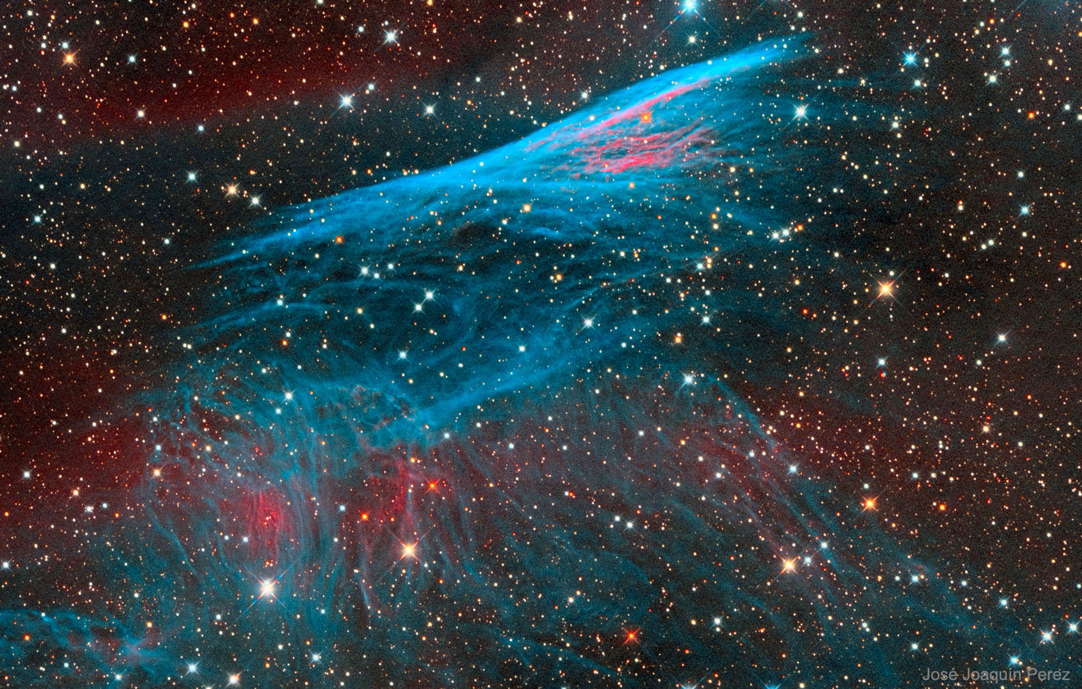 The Pencil Nebula in Red and Blue by José Joaquín Perez